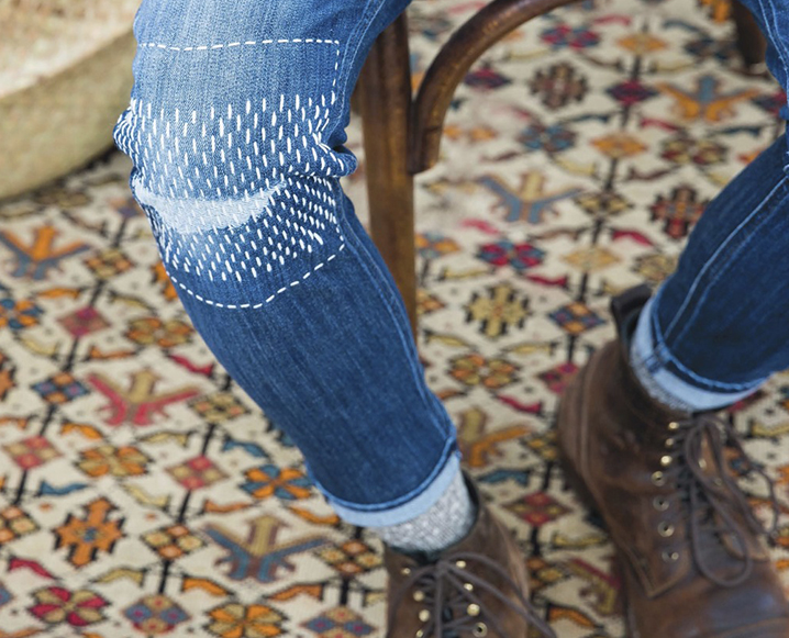 stitching torn jeans