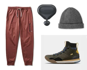 Men's holiday Gift Guide 2022 shown: pants joggers theragun beanie and bootes