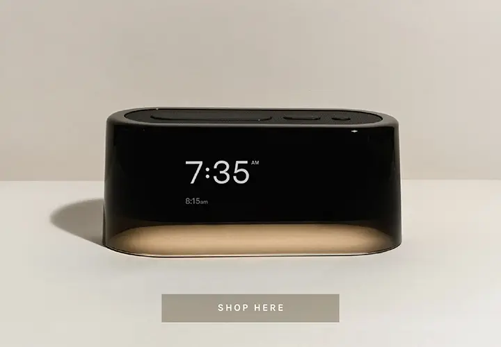 Loftie screen-free smart alarm clock on nightstand