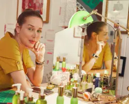 Tata Harper with skincare products at her vanity