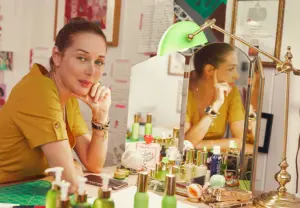 Tata Harper with skincare products at her vanity