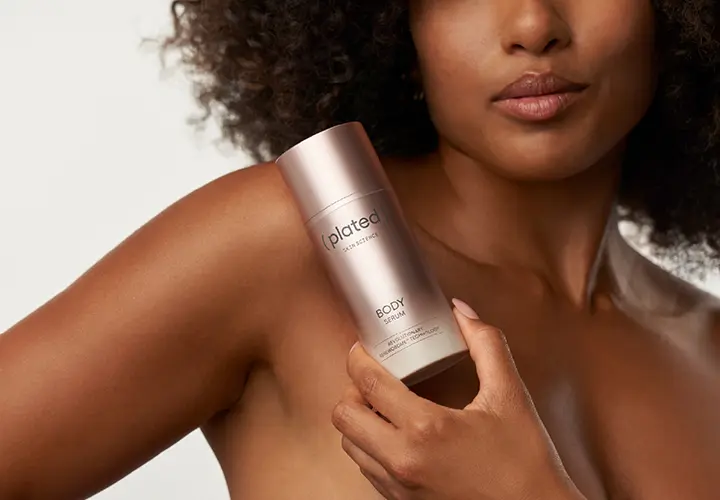 Woman holding Plated Body exosome serum