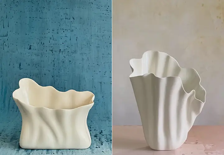Two sculptural Sullivan Owen porcelain vases with draped, curved forms