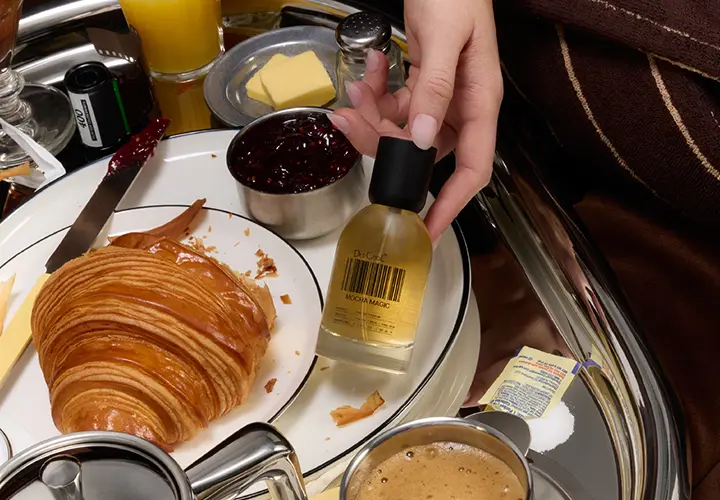 DedCool Mocha Magic perfume with croissant and coffee at breakfast