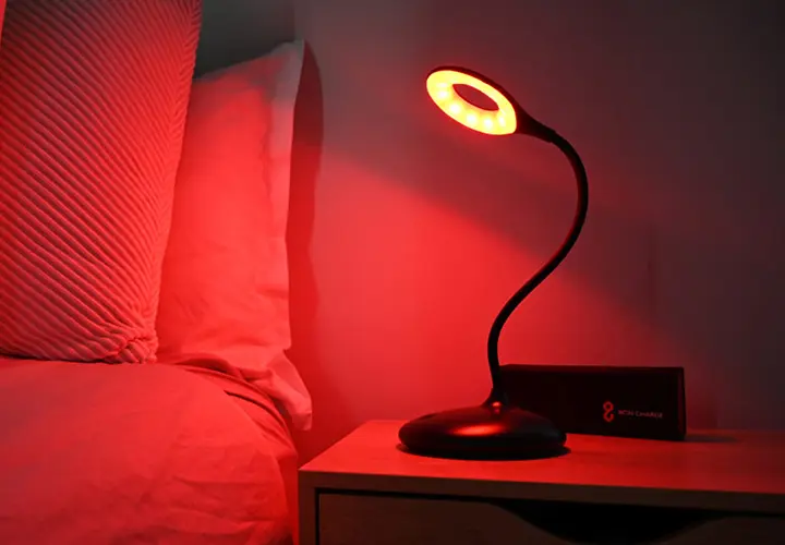 BON CHARGE Blue Light Blocking Lamp beside a bed for evening sleep routines