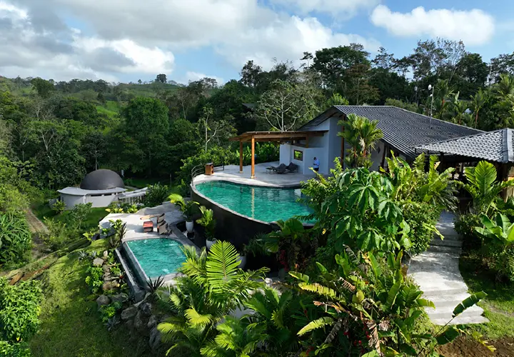 Pools and rainforest surroundings at The Vessyl wellness resort in Costa Rica
