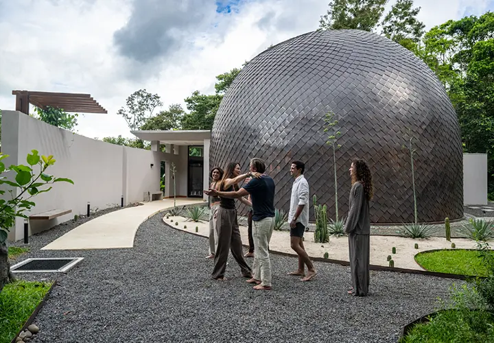 Guests gathered outside the Frequency Dome at The Vessyl in Costa Rica